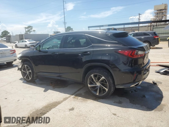 2016 Lexus RX 350 with VIN 2T2ZZMCA7GC012103, listed as a Copart auction lot 62763585 with 297,427 mi miles and Salvage title. Bid and sale history available at DreamBid. Image 2.