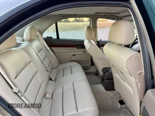 2001 Cadillac Catera z VIN W06VR54R01R009345, wystawiony jako Copart lot #80393534 z przebiegiem 43 757 mil mil oraz Tytuł czysty. Historia ofert i sprzedaży dostępna na DreamBid. Obrazek 6.