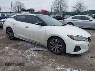 2019 Nissan Maxima Platinum z VIN 1N4AA6AV6KC377681, wystawiony jako IAAI lot #41287440 z przebiegiem 79 190 mil mil oraz . Historia ofert i sprzedaży dostępna na DreamBid. Obrazek 1.