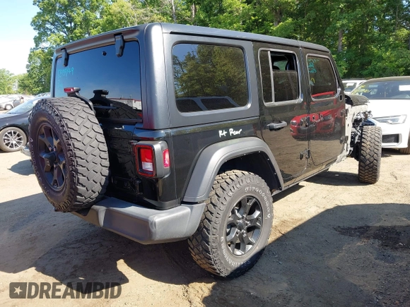 2021 Jeep Wrangler Unlimited Sport S with VIN 1C4HJXDNXMW646194, listed as a IAAI auction lot 42243169 with 44,237 mi miles and . Bid and sale history available at DreamBid. Image 4.