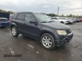 2009 Suzuki Grand Vitara z VIN JS3TE149794100133, wystawiony jako Copart lot #52919795 z przebiegiem 207 928 mil mil oraz Szkoda całkowita • Salvage title. Historia ofert i sprzedaży dostępna na DreamBid. Obrazek 4.