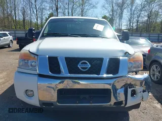 2014 Nissan Titan S with VIN 1N6AA0EC3EN502951, listed as a IAAI auction lot 41956309 with 128,464 mi miles and . Bid and sale history available at DreamBid. Image 12.