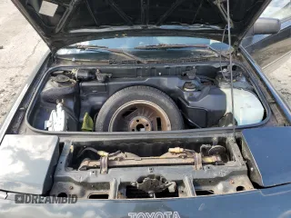 1986 Toyota MR2 z VIN JT2AW15C6G0075929, wystawiony jako Copart lot #68167924 z przebiegiem 123 975 mil mil oraz Tytuł czysty. Historia ofert i sprzedaży dostępna na DreamBid. Obrazek 11.