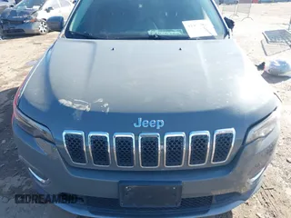 2020 Jeep Cherokee Limited with VIN 1C4PJLDB3LD606091, listed as a IAAI auction lot 41473098 with 49,819 mi miles. Bid and sale history available at carsss.com. Image 12.