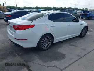 2015 Kia Optima SX Turbo with VIN 5XXGR4A60FG503940, listed as a IAAI auction lot 41944773 with 214,914 mi miles. Bid and sale history available at carsss.com. Image 4.
