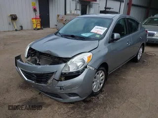 2014 Nissan Versa SV with VIN 3N1CN7AP3EL838748, listed as a IAAI auction lot 42079855 with 165,329 mi miles and . Bid and sale history available at carsss.com. Image 2.