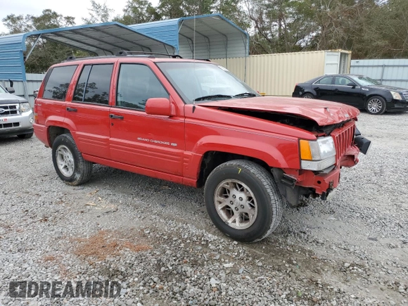 1998 Jeep Grand Cherokee Limited z VIN 1J4GZ78S0WC276411, wystawiony jako Copart lot #78200114 z przebiegiem 220 856 mil mil oraz Szkoda całkowita • Salvage title. Historia ofert i sprzedaży dostępna na DreamBid. Obrazek 4.