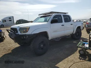 2014 Toyota Tacoma with VIN 3TMLU4EN7EM144839, listed as a Copart auction lot 52728065 with 32,610 mi miles and Salvage Title. Bid and sale history available at DreamBid. Image 1.