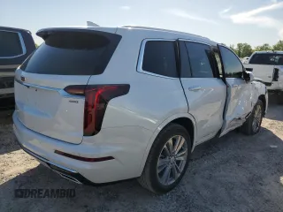 2024 Cadillac XT6 FWD Premium Luxury with VIN 1GYKPCRS1RZ700963, listed as a Copart auction lot 49031094 with 2,977 mi miles and Salvage Title. Bid and sale history available at carsss.com. Image 3.