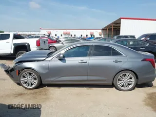 2022 Cadillac CT4 Premium Luxury z VIN 1G6DB5RK6N0118383, wystawiony jako IAAI lot #42042326 z przebiegiem 56 310 mil mil oraz . Historia ofert i sprzedaży dostępna na DreamBid. Obrazek 14.