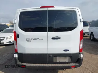 2022 Ford Transit Passenger XL with VIN 1FBAX2Y85NKA67506, listed as a IAAI auction lot 41509594 with 209,455 mi miles and . Bid and sale history available at DreamBid. Image 16.
