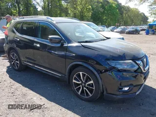 2017 Nissan Rogue SL z VIN JN8AT2MV4HW278622, wystawiony jako IAAI lot #42234142 z przebiegiem 103 884 mil mil oraz . Historia ofert i sprzedaży dostępna na DreamBid. Obrazek 1.