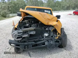 2022 Ford Bronco z VIN 1FMEE5DH2NLB68468, wystawiony jako Copart lot #53645805 z przebiegiem 25 411 mil mil oraz Szkoda całkowita • Salvage title. Historia ofert i sprzedaży dostępna na DreamBid. Obrazek 14.