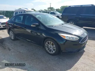 2017 Ford Focus SE z VIN 1FADP3F24HL217719, wystawiony jako IAAI lot #42560745 z przebiegiem 93 595 mil mil oraz . Historia ofert i sprzedaży dostępna na DreamBid. Obrazek 1.