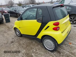 2008 Smart fortwo Pure z VIN WMEEJ31X58K163695, wystawiony jako IAAI lot #41967790 z przebiegiem 133 970 mil mil oraz . Historia ofert i sprzedaży dostępna na DreamBid. Obrazek 3.