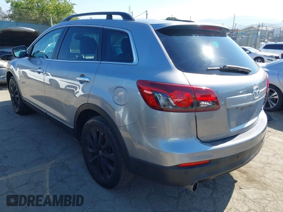 2014 Mazda CX-9 Grand Touring z VIN JM3TB3DV9E0437380, wystawiony jako IAAI lot #42298066 z przebiegiem 169 644 mil mil oraz . Historia ofert i sprzedaży dostępna na DreamBid. Obrazek 3.
