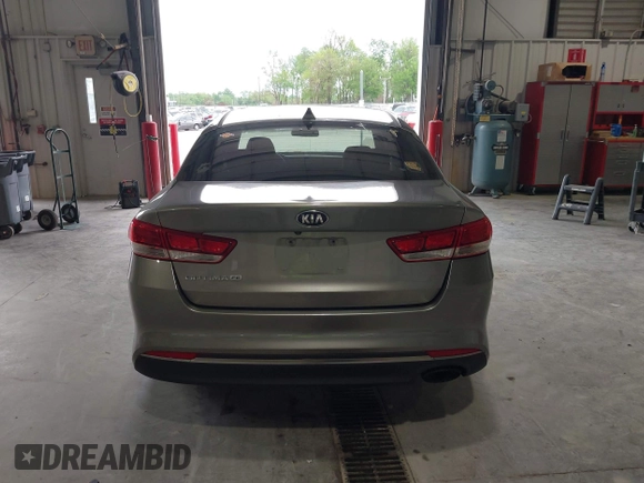 2016 Kia Optima LX with VIN 5XXGT4L33GG026183, listed as a IAAI auction lot 42156799 with 163,000 mi miles and . Bid and sale history available at carsss.com. Image 16.