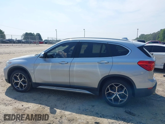 2018 BMW X1 xDrive28i with VIN WBXHT3C39J5L27926, listed as a IAAI auction lot 42582330 with 101,197 mi miles and . Bid and sale history available at DreamBid. Image 14.