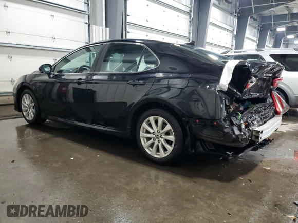2020 Toyota Camry LE with VIN 4T1L11AK3LU994037, listed as a Copart auction lot 84164204 with 57,363 mi miles and Salvage Title. Bid and sale history available at carsss.com. Image 2.