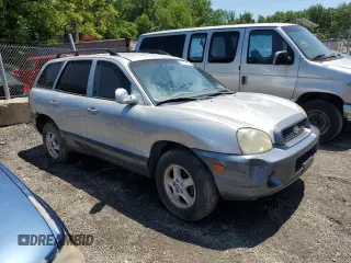 2004 Hyundai Santa Fe z VIN KM8SB12B14U711904, wystawiony jako Copart lot #58957365 z przebiegiem 214 051 mil mil oraz Szkoda całkowita • Salvage title. Historia ofert i sprzedaży dostępna na DreamBid. Obrazek 4.