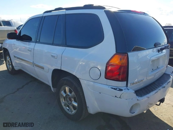 2002 GMC Envoy SLT with VIN 1GKDS13S522216498, listed as a IAAI auction lot 41642757 with 164,981 mi miles. Bid and sale history available at carsss.com. Image 3.