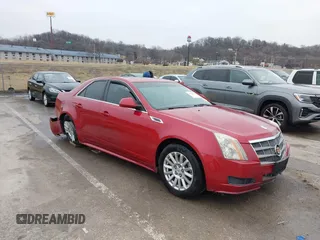 2010 Cadillac CTS Luxury with VIN 1G6DG5EG0A0134916, listed as a IAAI auction lot 41544546 with 126,769 mi miles and . Bid and sale history available at DreamBid. Image 1.