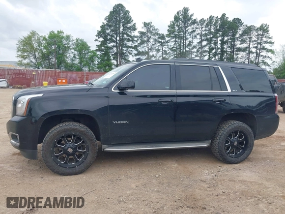 2015 GMC Yukon SLT with VIN 1GKS1BKC5FR274408, listed as a IAAI auction lot 41942157 with 165,978 mi miles. Bid and sale history available at carsss.com. Image 14.