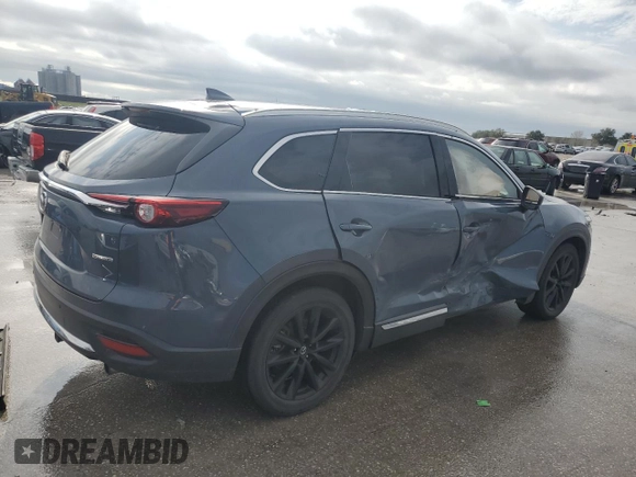 2021 Mazda CX-9 Grand Touring z VIN JM3TCADYXM0519757, wystawiony jako Copart lot #86665134 z przebiegiem 51 217 mil mil oraz Szkoda całkowita • Salvage title. Historia ofert i sprzedaży dostępna na DreamBid. Obrazek 3.