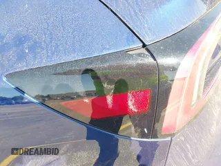 2024 Tesla Model 3 z VIN 5YJ3E1EAXRF751577, wystawiony jako IAAI lot #41831992 z przebiegiem 11 mil mil oraz . Historia ofert i sprzedaży dostępna na DreamBid. Obrazek 13.