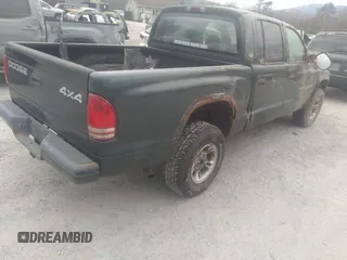 2000 Dodge Dakota Sport with VIN 1B7HG2AZ6YS661541, listed as a IAAI auction lot 41674406 with 204,117 mi miles. Bid and sale history available at carsss.com. Image 4.