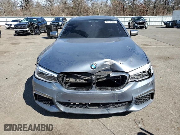 2018 BMW 5 Series M550i xDrive z VIN WBAJB9C55JB036120, wystawiony jako Copart lot #49134865 z przebiegiem Nie podano mil oraz Szkoda całkowita • Salvage title. Historia ofert i sprzedaży dostępna na DreamBid. Obrazek 5.