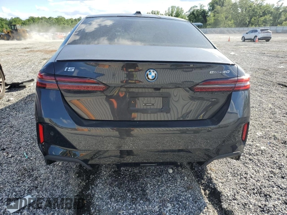 2024 BMW i5 eDrive40 with VIN WBY33FK04RCR49355, listed as a Copart auction lot 55828475 with Not Provided miles and Salvage Title. Bid and sale history available at DreamBid. Image 6.