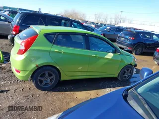 2013 Hyundai Accent GS z VIN KMHCT5AE9DU072191, wystawiony jako IAAI lot #41802024 z przebiegiem 52 491 mil mil oraz . Historia ofert i sprzedaży dostępna na DreamBid. Obrazek 14.