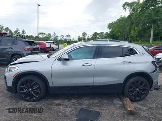2022 BMW X2 sDrive28i z VIN WBXYH9C09N5T71828, wystawiony jako IAAI lot #40536245 z przebiegiem 36 012 mil mil oraz . Historia ofert i sprzedaży dostępna na DreamBid. Obrazek 15.