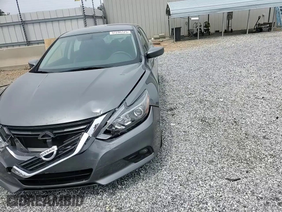 2017 Nissan Altima SR z VIN 1N4AL3AP7HC136120, wystawiony jako Copart lot #57295125 z przebiegiem 84 300 mil mil oraz Szkoda całkowita • Salvage title. Historia ofert i sprzedaży dostępna na DreamBid. Obrazek 13.