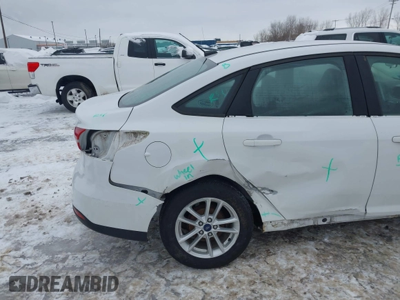 2017 Ford Focus SE with VIN 1FADP3F20HL235067, listed as a IAAI auction lot 41580300 with 79,009 mi miles and . Bid and sale history available at DreamBid. Image 12.