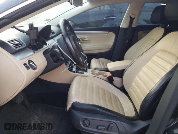 2016 Volkswagen CC Sport with VIN WVWBN7AN2GE504009, listed as a Copart auction lot 66606304 with 133,794 mi miles and Salvage Title. Bid and sale history available at carsss.com. Image 7.