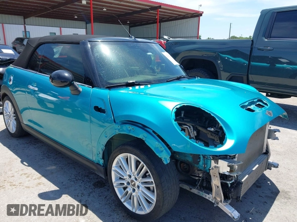 2017 MINI Convertible Cooper S z VIN WMWWG9C30H3C80917, wystawiony jako IAAI lot #42227320 z przebiegiem 38 490 mil mil oraz . Historia ofert i sprzedaży dostępna na DreamBid. Obrazek 1.