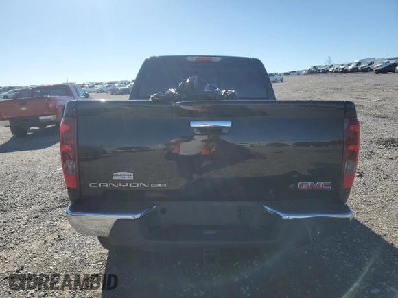 2012 GMC Canyon SLE2 with VIN 1GTH6PFE5C8166338, listed as a Copart auction lot 80087584 with 83,745 mi miles and Salvage Title. Bid and sale history available at carsss.com. Image 6.