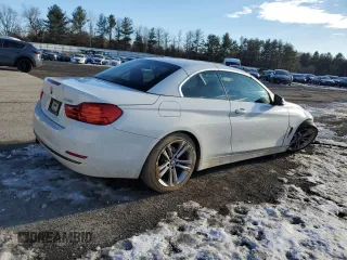 2015 BMW 4 Series 428i with VIN WBA3V7C54FP772674, listed as a Copart auction lot 88060515 with 95,980 mi miles and Salvage Title. Bid and sale history available at carsss.com. Image 3.