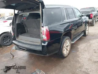 2017 GMC Yukon SLE with VIN 1GKS2AKC0HR136012, listed as a IAAI auction lot 41707322 with 81,821 mi miles. Bid and sale history available at carsss.com. Image 4.