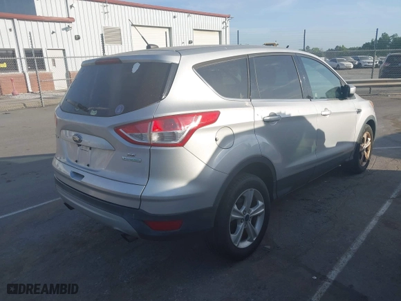 2014 Ford Escape SE with VIN 1FMCU0GX3EUE33604, listed as a IAAI auction lot 42080186 with 149,930 mi miles. Bid and sale history available at carsss.com. Image 4.