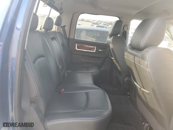 2009 Dodge Ram 1500 Laramie with VIN 1D3HB13T89J521779, listed as a Copart auction lot 48239135 with 144,414 mi miles and Salvage Title. Bid and sale history available at carsss.com. Image 10.