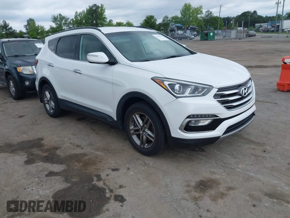 2018 Hyundai Santa Fe 2.4L z VIN 5XYZUDLB1JG543837, wystawiony jako IAAI lot #42235471 z przebiegiem 157 909 mil mil oraz . Historia ofert i sprzedaży dostępna na DreamBid. Obrazek 1.