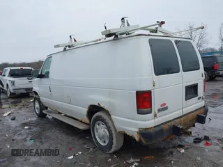 2008 Ford Econoline Cargo Commercial with VIN 1FTNE24W68DA79471, listed as a IAAI auction lot 41448543 with 196,981 mi miles and . Bid and sale history available at DreamBid. Image 3.
