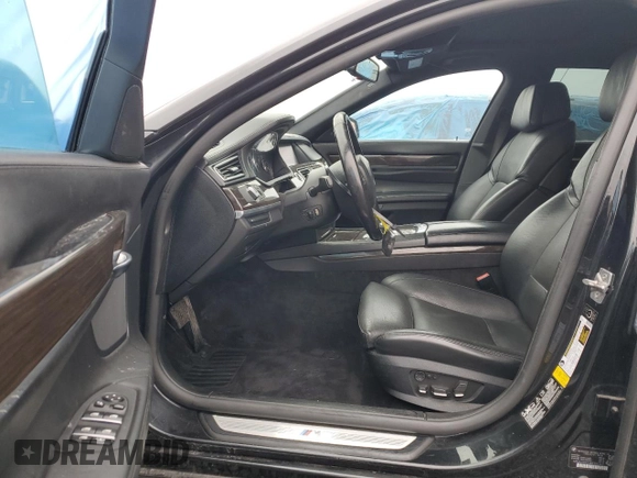 2011 BMW 7 Series 750i xDrive with VIN WBAKC6C54BC395163, listed as a Copart auction lot 82184484 with 74,331 mi miles and Clean title. Bid and sale history available at DreamBid. Image 7.