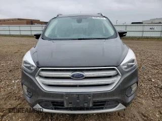 2019 Ford Escape Titanium z VIN 1FMCU9J99KUC31182, wystawiony jako Copart lot #60972815 z przebiegiem 94 464 mil mil oraz Szkoda całkowita • Salvage title. Historia ofert i sprzedaży dostępna na DreamBid. Obrazek 5.