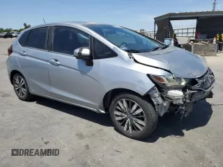 2017 Honda Fit EX with VIN JHMGK5H79HS001542, listed as a Copart auction lot 58732445 with 117,936 mi miles and Salvage title. Bid and sale history available at DreamBid. Image 4.