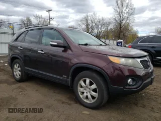 2011 Kia Sorento LX with VIN 5XYKTCA13BG055192, listed as a Copart auction lot 52969655 with 263,011 mi miles and Salvage Title. Bid and sale history available at DreamBid. Image 4.