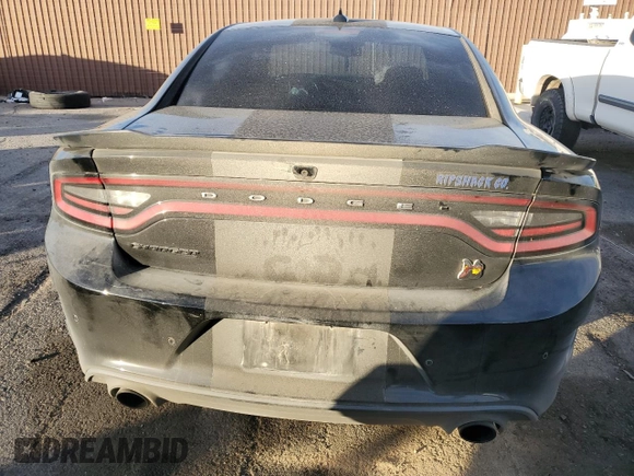 2020 Dodge Charger Scat Pack Widebody z VIN 2C3CDXGJ7LH231846, wystawiony jako Copart lot #87971485 z przebiegiem 60 856 mil mil oraz Szkoda całkowita • Salvage title. Historia ofert i sprzedaży dostępna na DreamBid. Obrazek 6.
